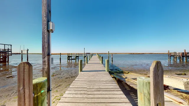 a view of balcony and floor with wooden fence