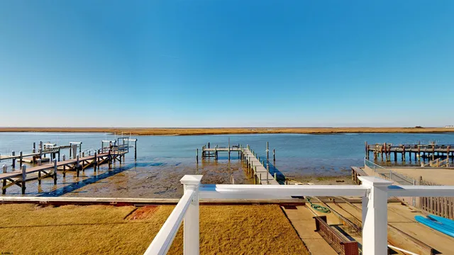 a view of a balcony with an ocean view