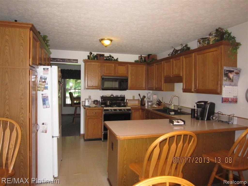 4203 North Latson Road Howell, MI 48855 - Photo 4 of 34 LATSON RD KITCHEN