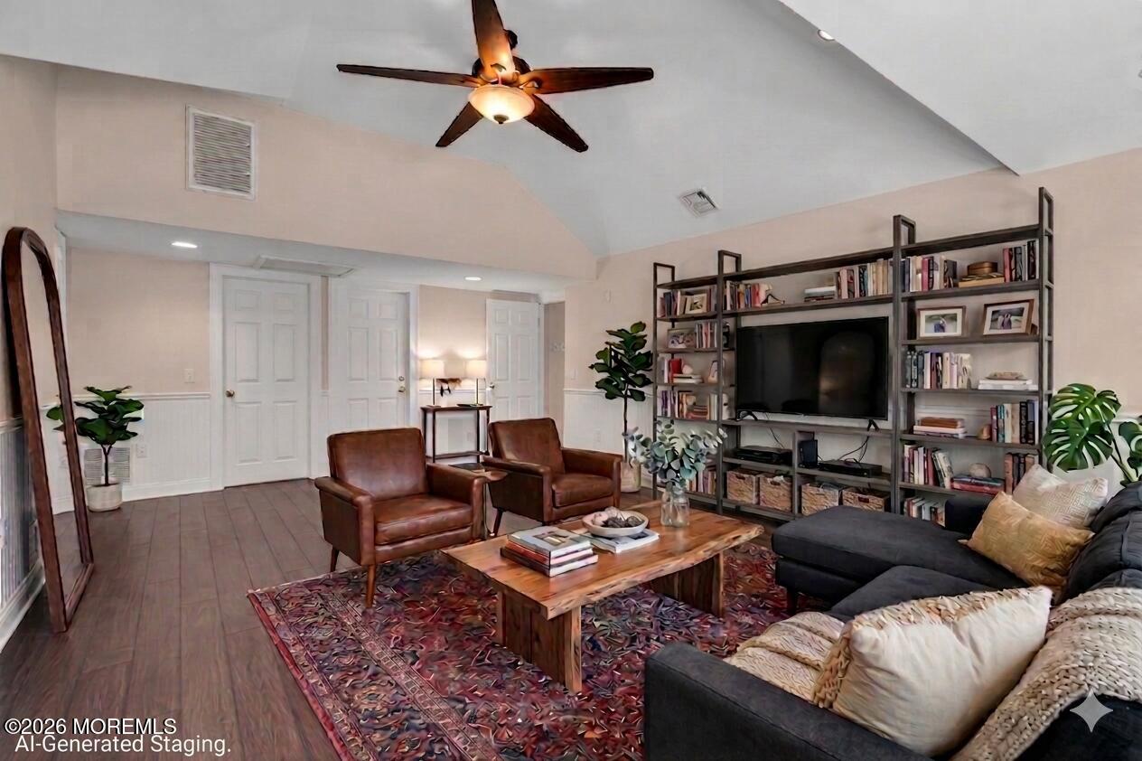 1001 Arnold Avenue Point Pleasant, NJ 08742 - Photo 1 of 14 a living room with furniture a flat screen tv and a table