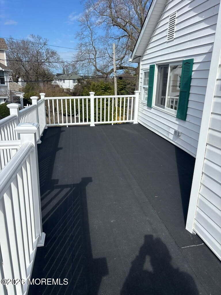 1001 Arnold Avenue Point Pleasant, NJ 08742 - Photo 13 of 14 a view of a balcony with wooden floor