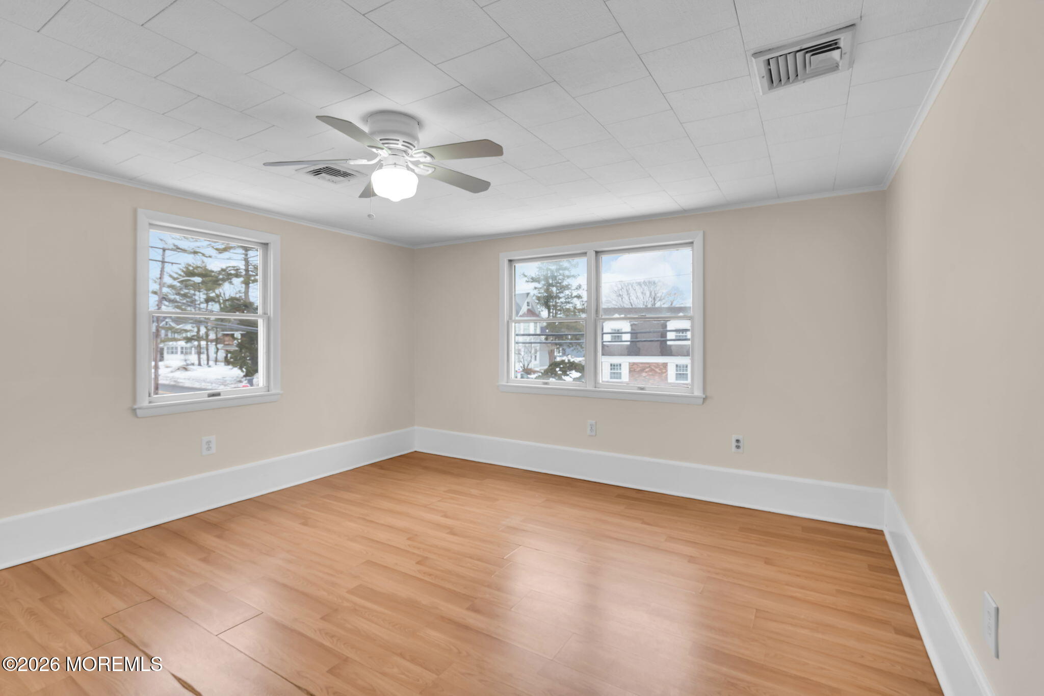 1001 Arnold Avenue Point Pleasant, NJ 08742 - Photo 8 of 14 wooden floor in an empty room with a window