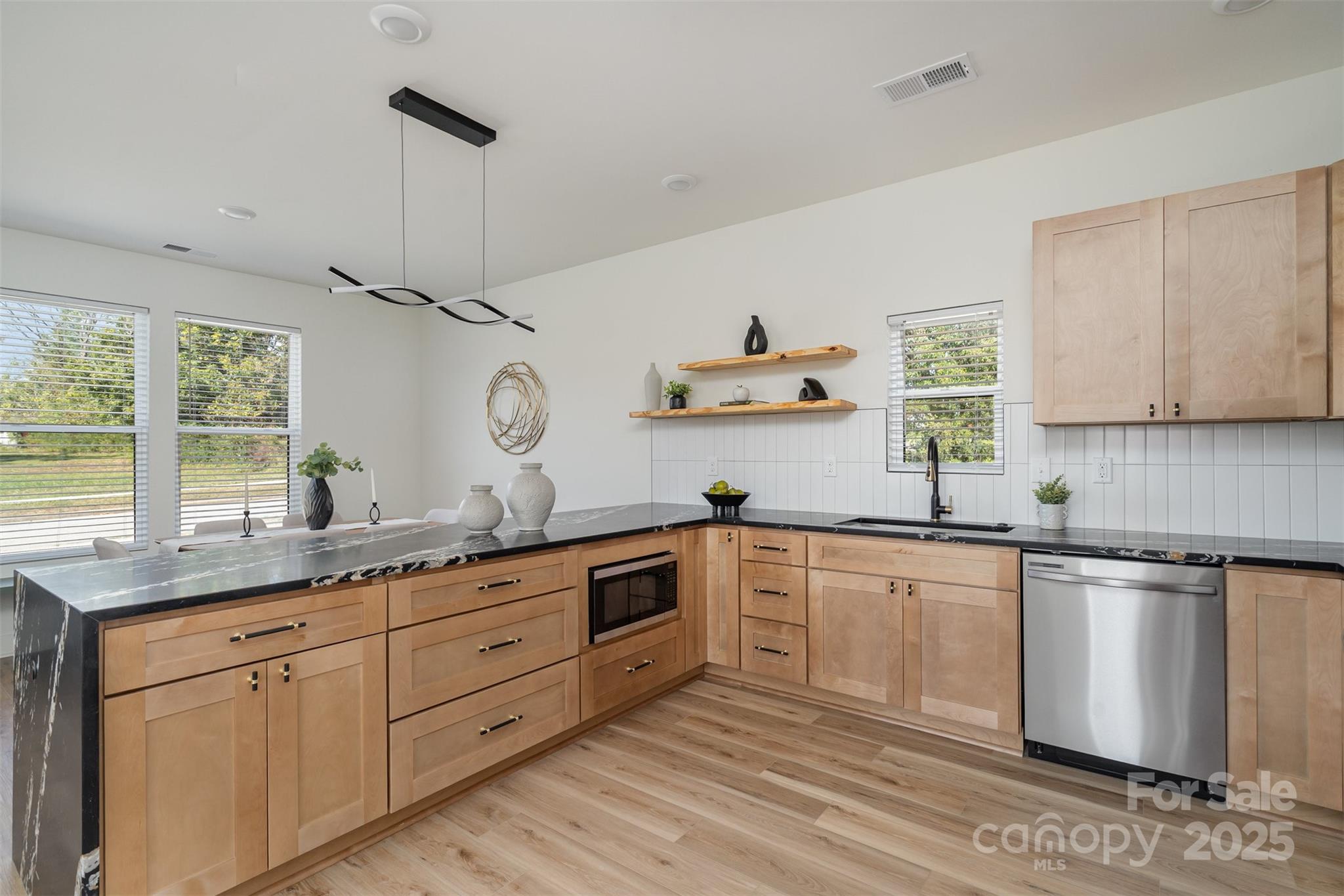223 Robin Circle Salisbury, NC 28144 - Photo 11 of 19 a kitchen with cabinets a sink and appliances