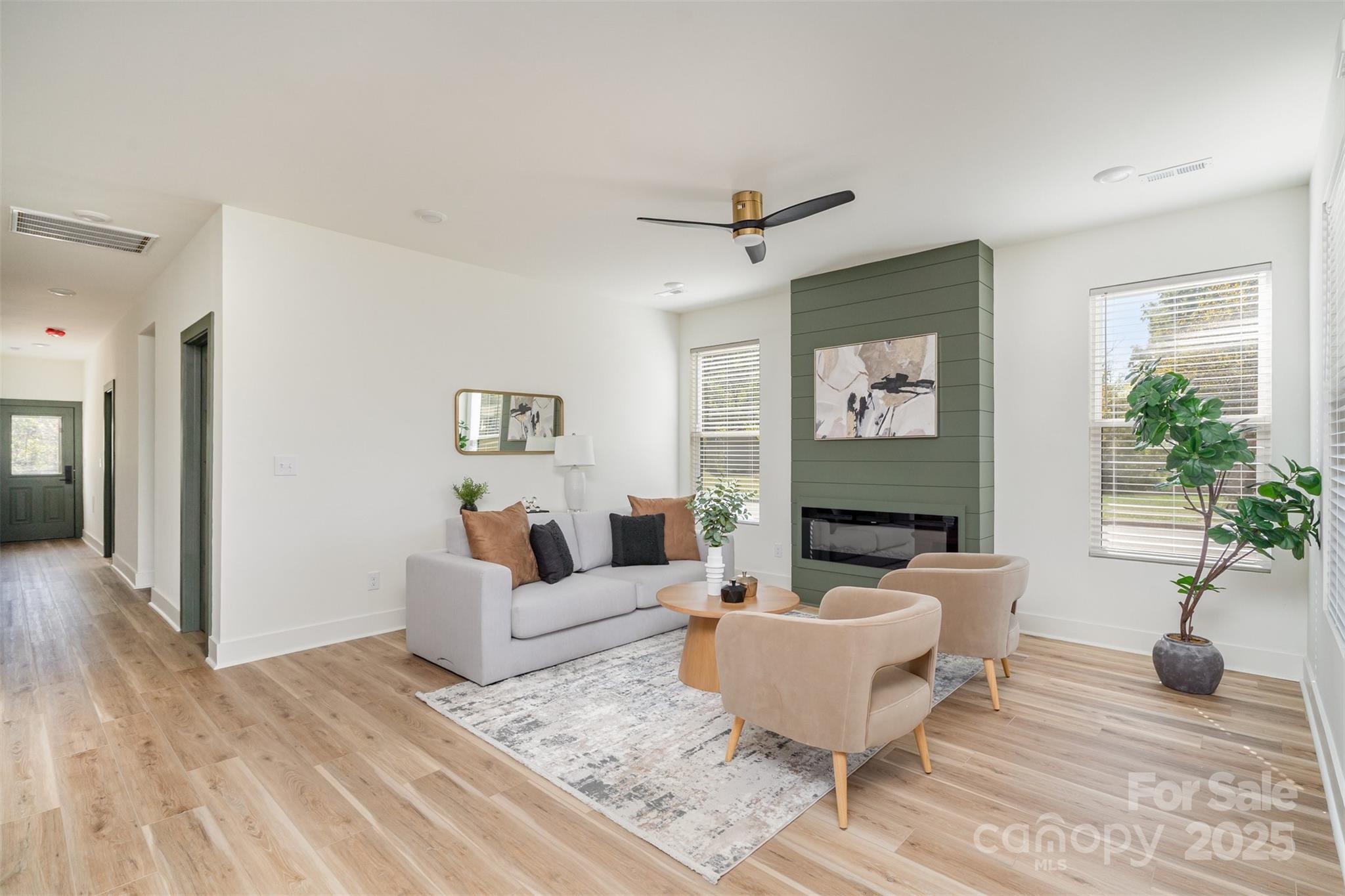 223 Robin Circle Salisbury, NC 28144 - Photo 4 of 19 a living room with furniture and a potted plant