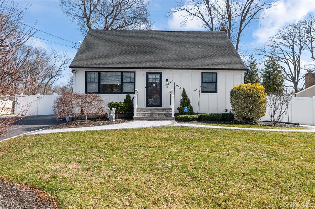 85 Joline Road Port Jefferson Station, NY 11776 - Photo 1 of 30 a front view of a house with garden