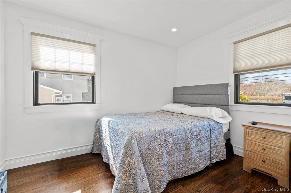 85 Joline Road Port Jefferson Station, NY 11776 - Photo 17 of 30 a bedroom with a bed and a window