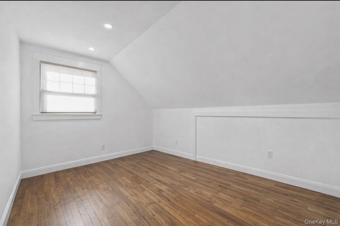 85 Joline Road Port Jefferson Station, NY 11776 - Photo 20 of 30 an empty room with wooden floor and windows