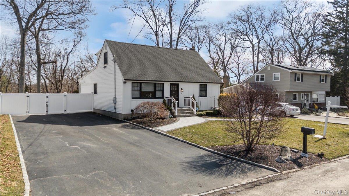85 Joline Road Port Jefferson Station, NY 11776 - Photo 2 of 30 a view of a house with swimming pool and sitting area