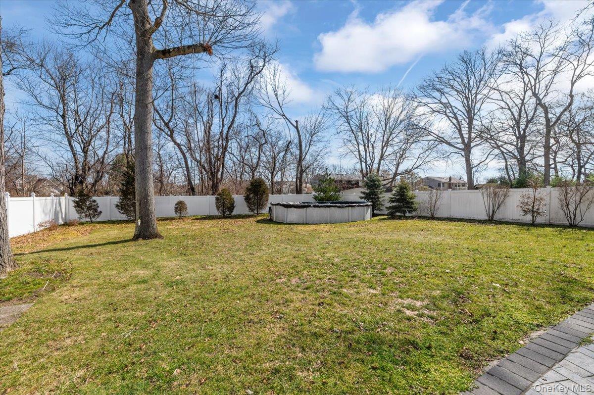 85 Joline Road Port Jefferson Station, NY 11776 - Photo 24 of 30 a view of road with large trees