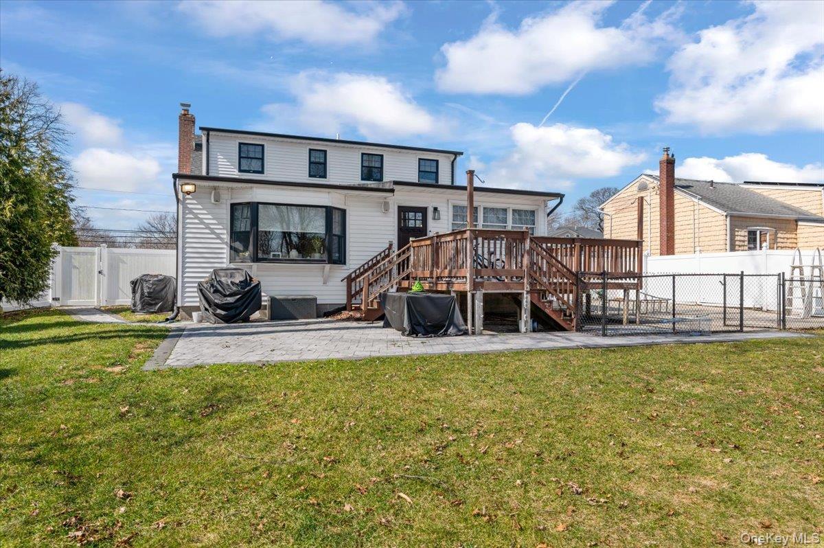 85 Joline Road Port Jefferson Station, NY 11776 - Photo 25 of 30 a view of a house with swimming pool and sitting area