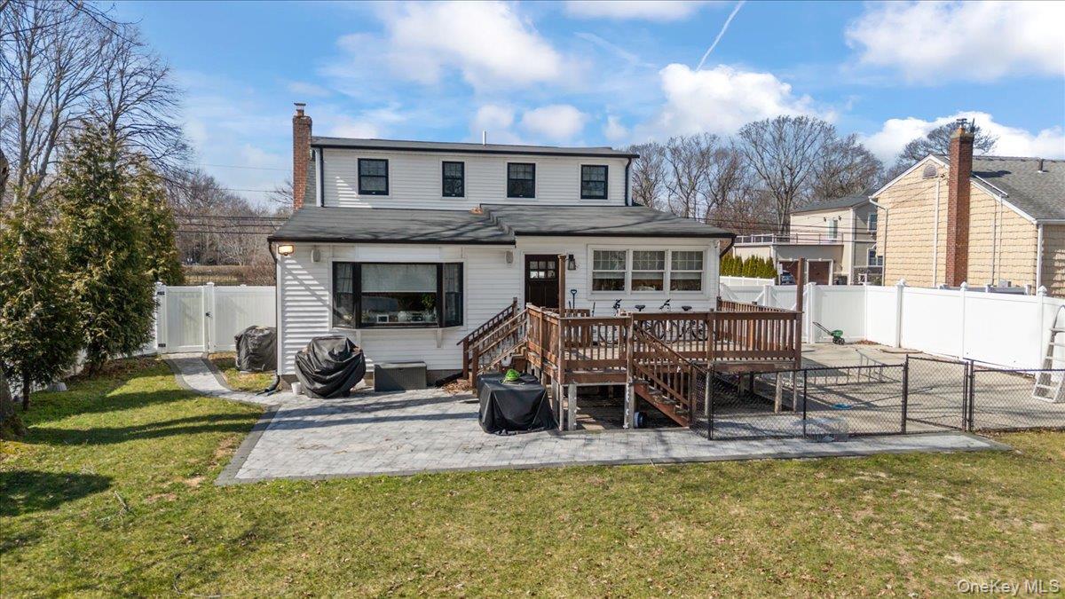 85 Joline Road Port Jefferson Station, NY 11776 - Photo 27 of 30 a view of a house with swimming pool and sitting area