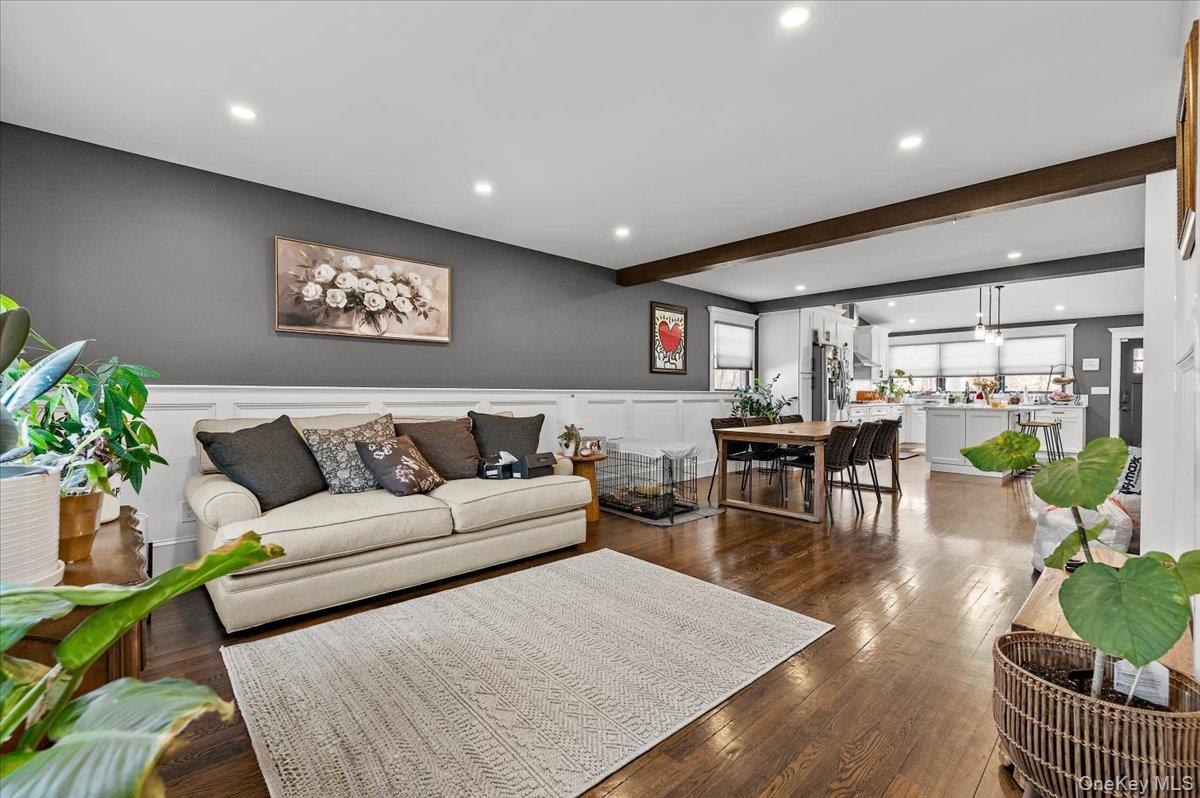 85 Joline Road Port Jefferson Station, NY 11776 - Photo 4 of 30 a living room with furniture wooden floor and a large window