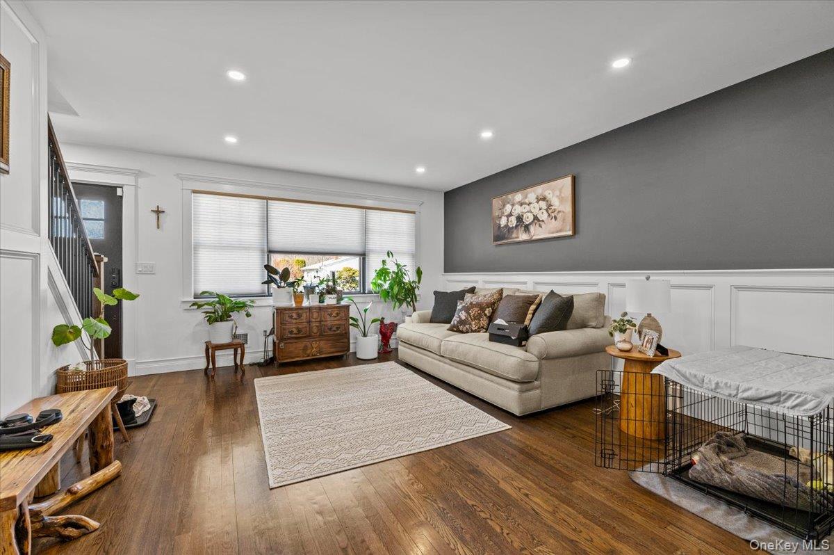 85 Joline Road Port Jefferson Station, NY 11776 - Photo 5 of 30 a living room with furniture and a flat screen tv