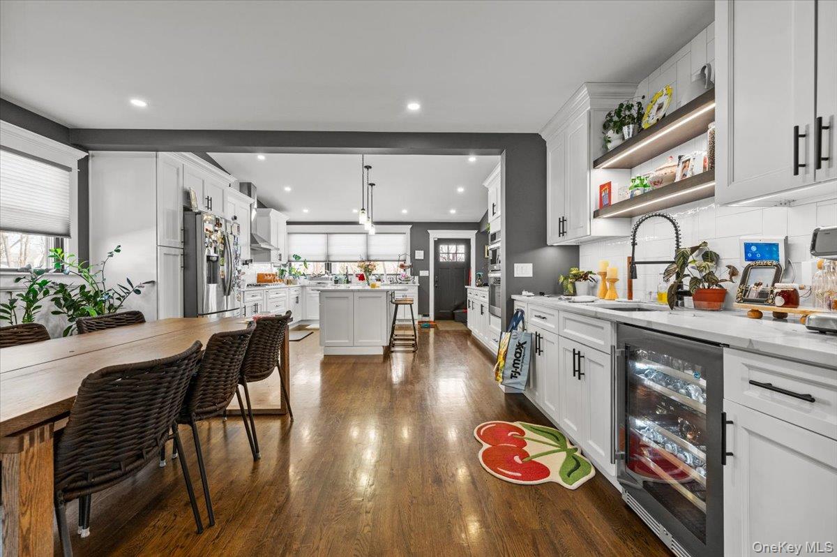 85 Joline Road Port Jefferson Station, NY 11776 - Photo 6 of 30 a kitchen with stainless steel appliances granite countertop a sink and cabinets