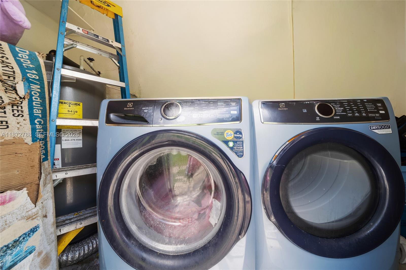 10440 Southwest 178th Street Miami, FL 33157 - Photo 25 of 30 a utility room with dryer and washer