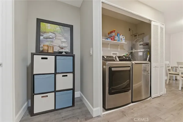 a kitchen with stainless steel appliances a stove and a refrigerator