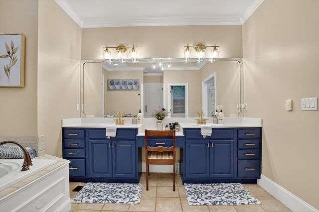 8179 Pineview Court Villa Rica, GA 30180 - Photo 17 of 41 a bathroom with a sink and a large mirror