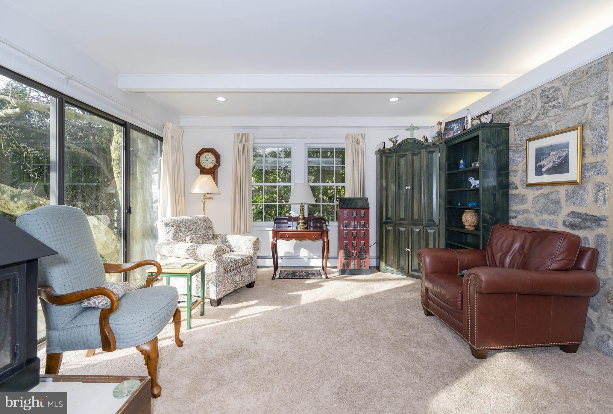 1006 Kent Road Greenville, DE 19807 - Photo 15 of 33 Family Room Boasts Stone Wall & Exposed Beams
