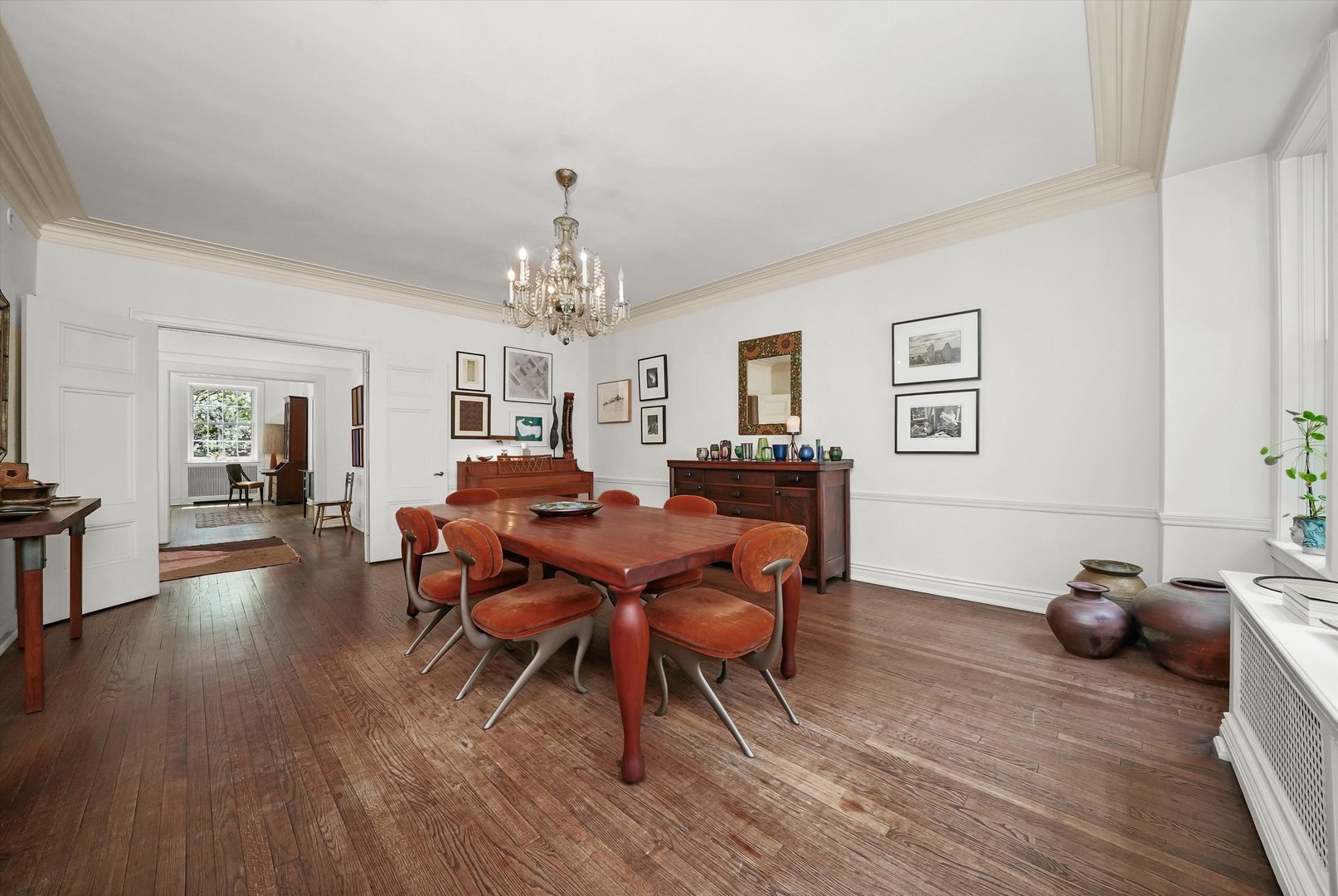 232 East Walton Place, Unit 3W Chicago, IL 60611 - Photo 31 of 50 a view of a dining room with furniture and wooden floor