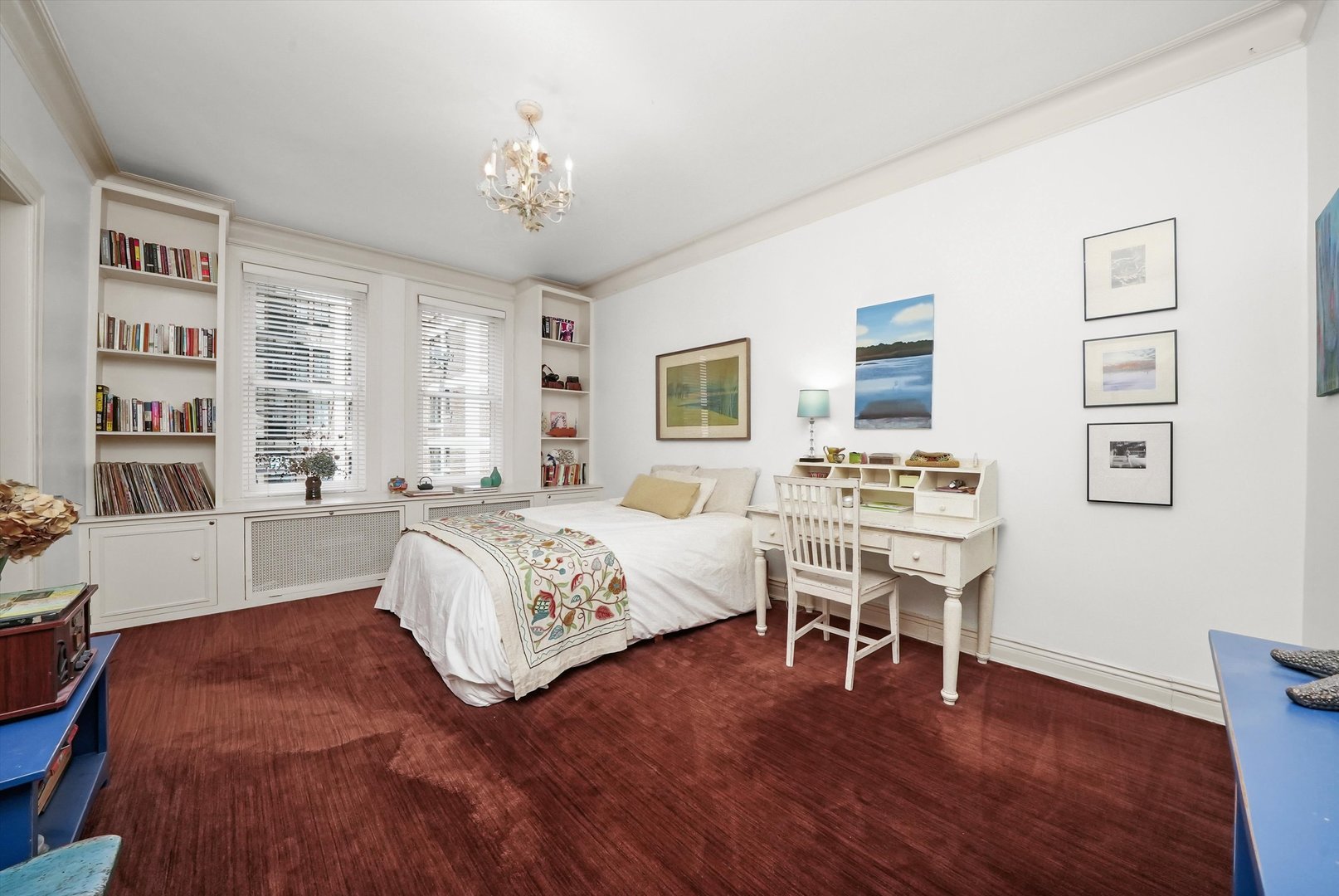 232 East Walton Place, Unit 3W Chicago, IL 60611 - Photo 38 of 50 a spacious bedroom with a bed and a table in it