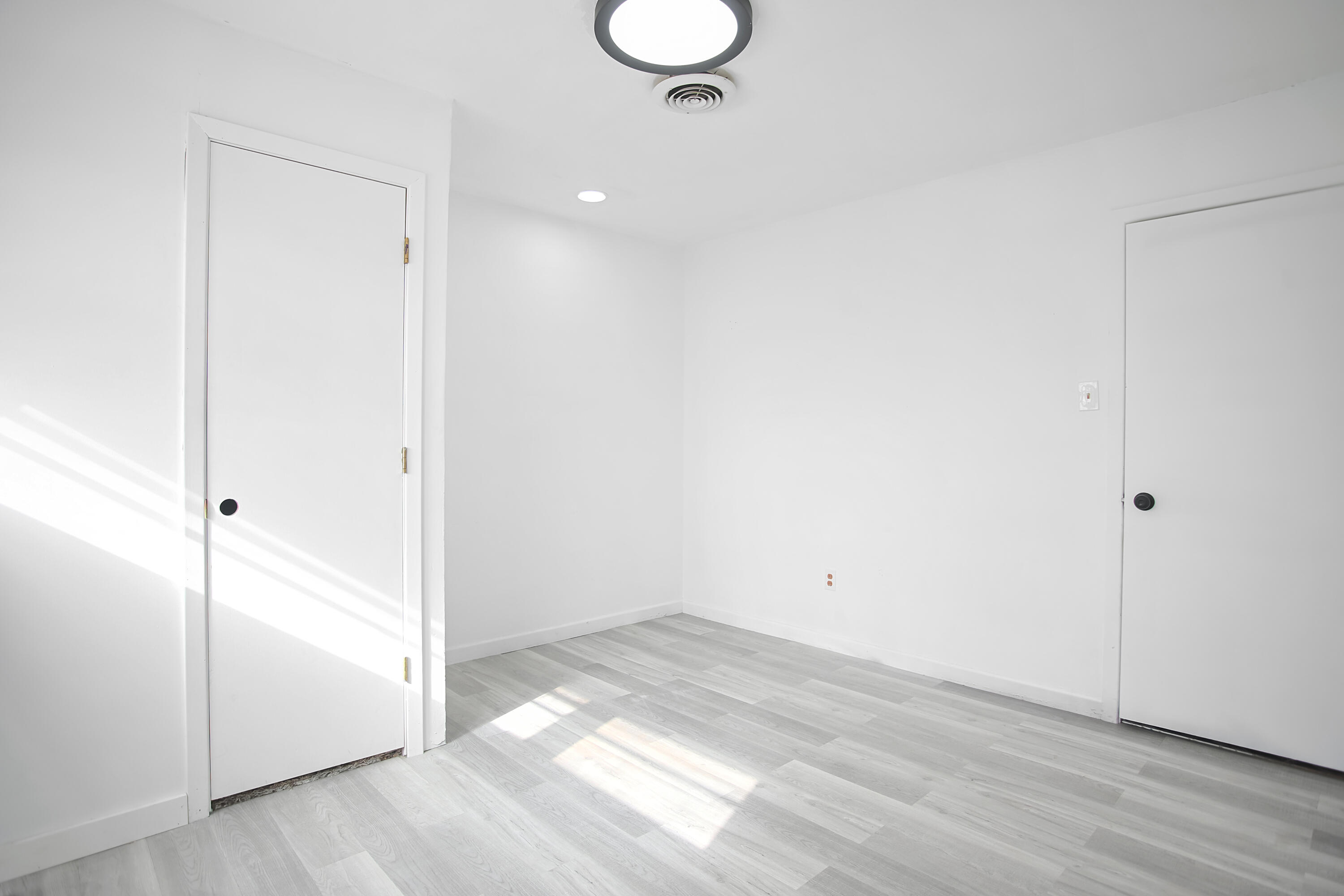 2801 52nd Street Lubbock, TX 79413 - Photo 19 of 34 a view of a room with wooden floor