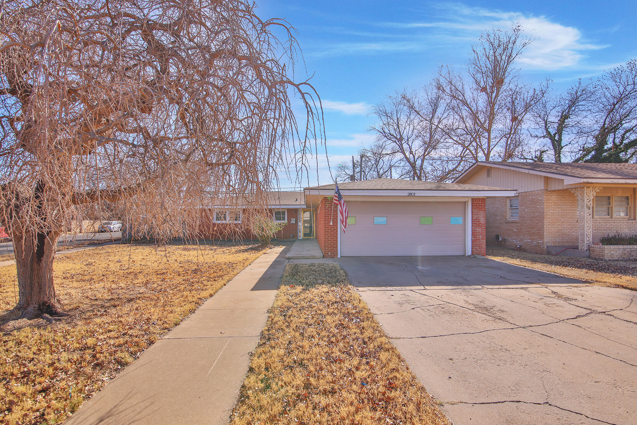 2801 52nd Street Lubbock, TX 79413 - Photo 2 of 34 a view of backyard of house