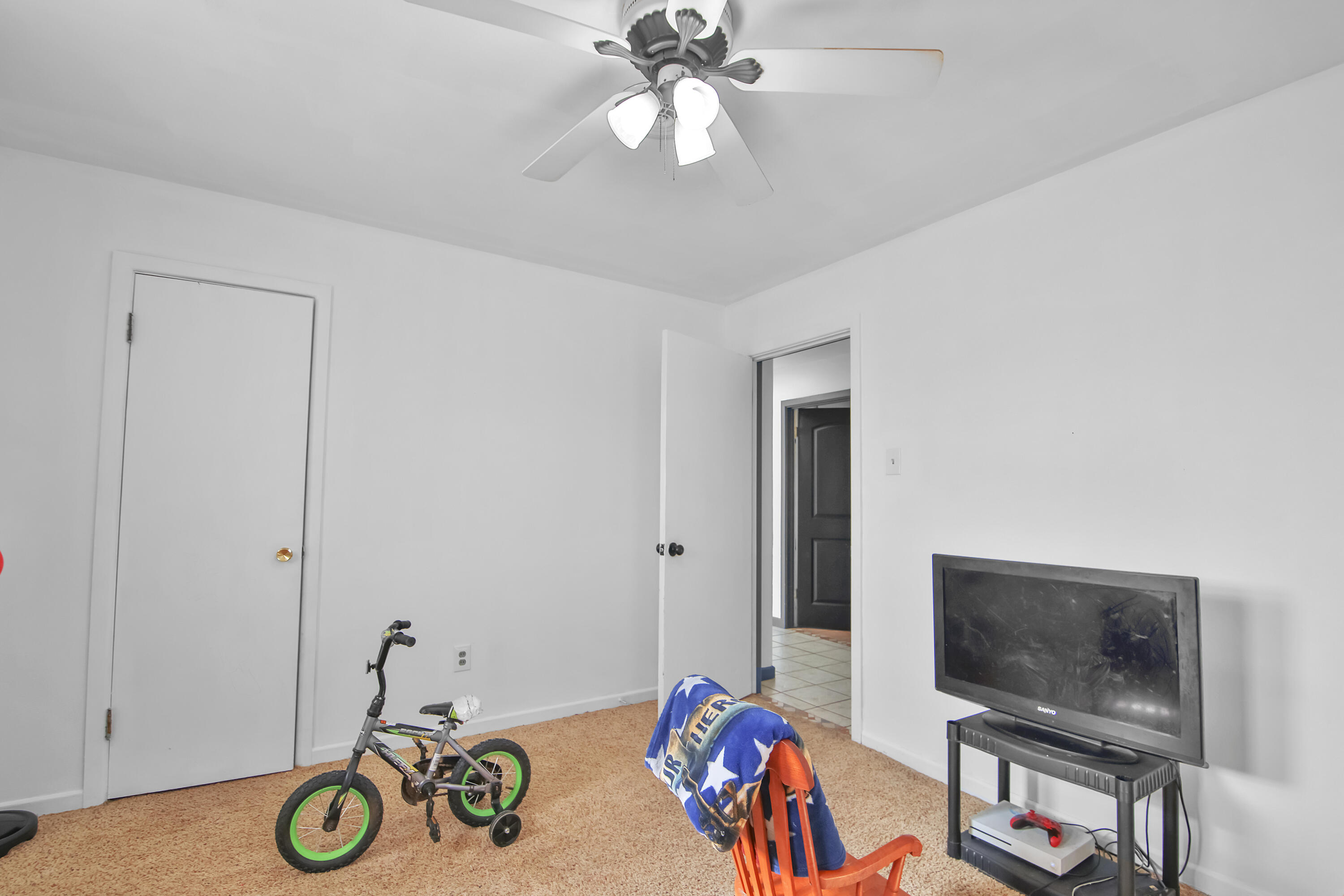 2801 52nd Street Lubbock, TX 79413 - Photo 28 of 34 a view of livingroom with furniture and flat screen tv