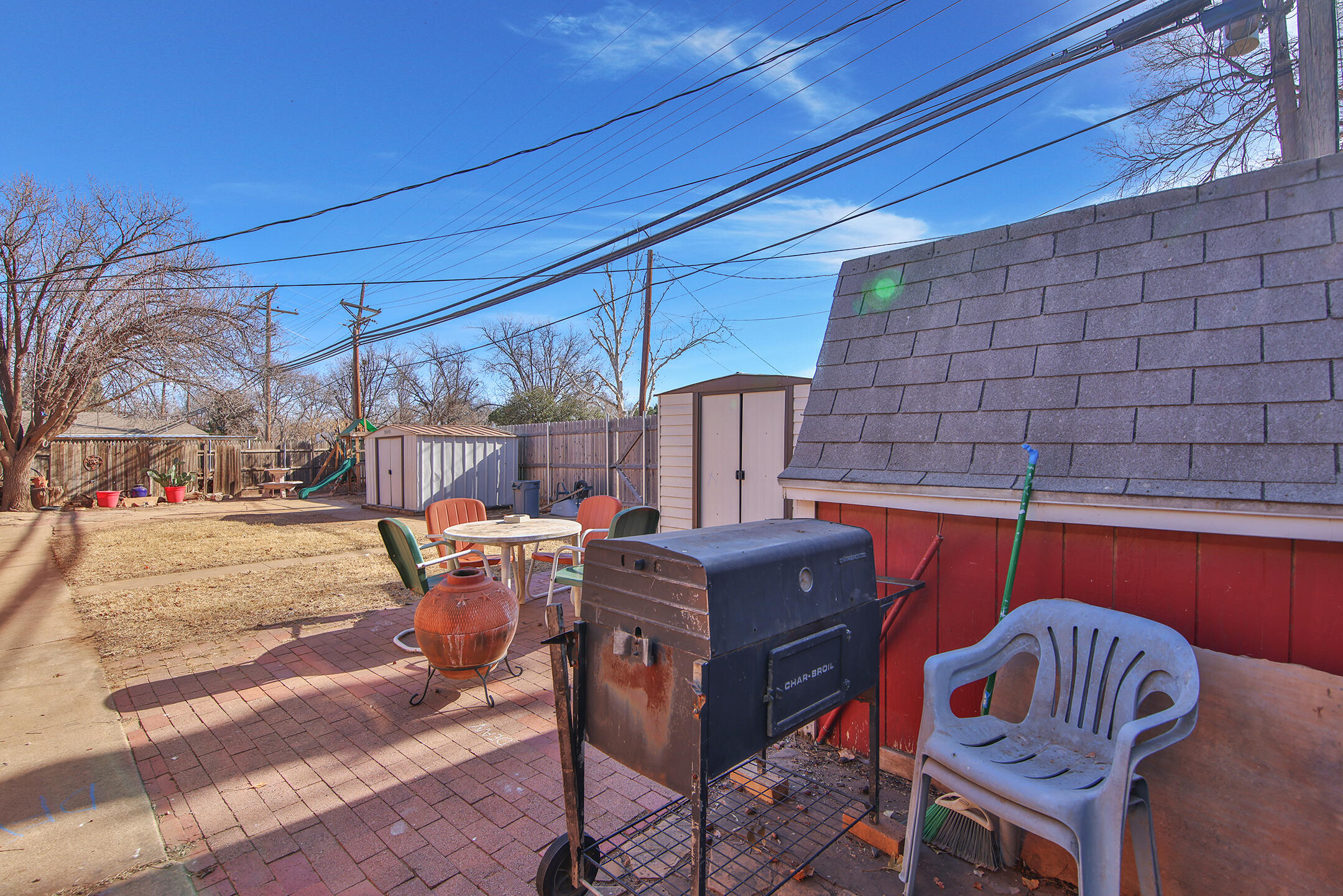 2801 52nd Street Lubbock, TX 79413 - Photo 29 of 34 a view of an outdoor sitting area with brick walls