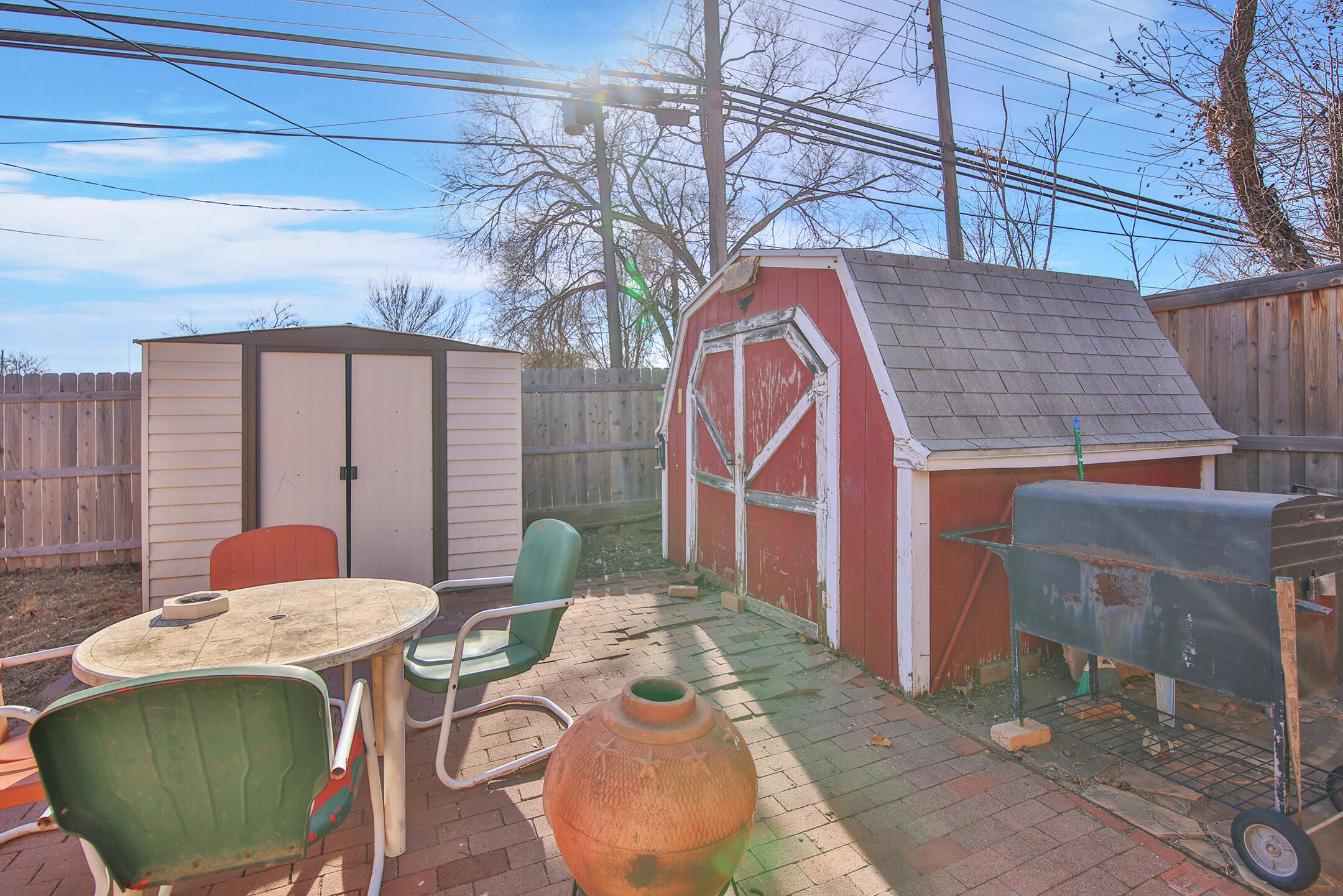 2801 52nd Street Lubbock, TX 79413 - Photo 30 of 34 a backyard of a house with seating space