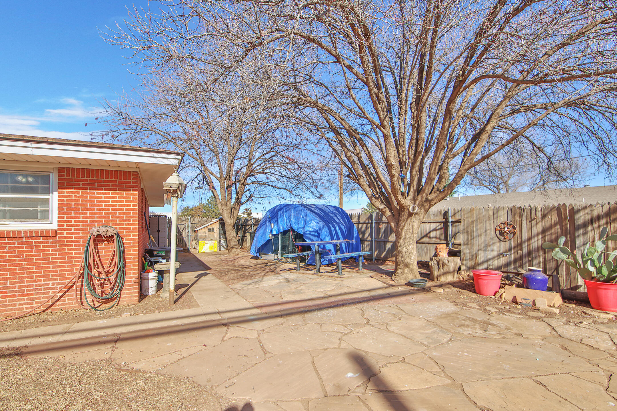 2801 52nd Street Lubbock, TX 79413 - Photo 32 of 34 a view of a house with a snow