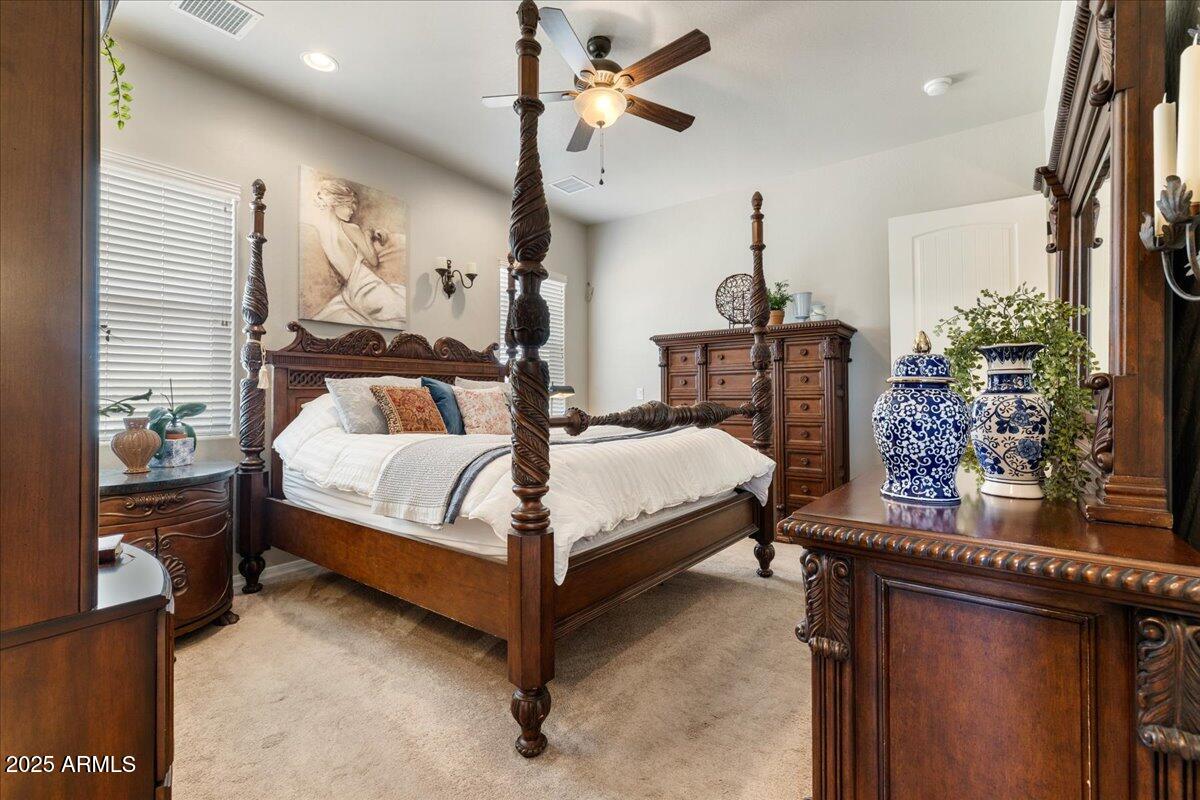 2135 West Bridle Path Road Prescott, AZ 86305 - Photo 13 of 32 a bedroom with a bed dresser and a window