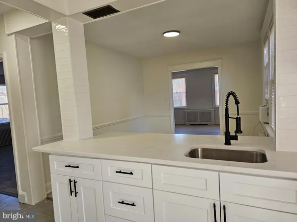 a close view of a sink and a vanity in the bathroom