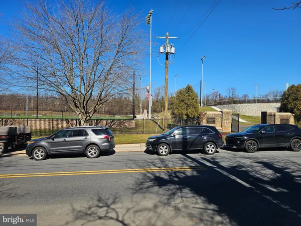 a view of a car parked in front of a house
