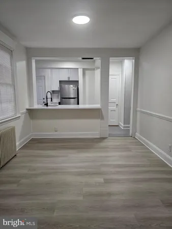 a view hallway with chair and window