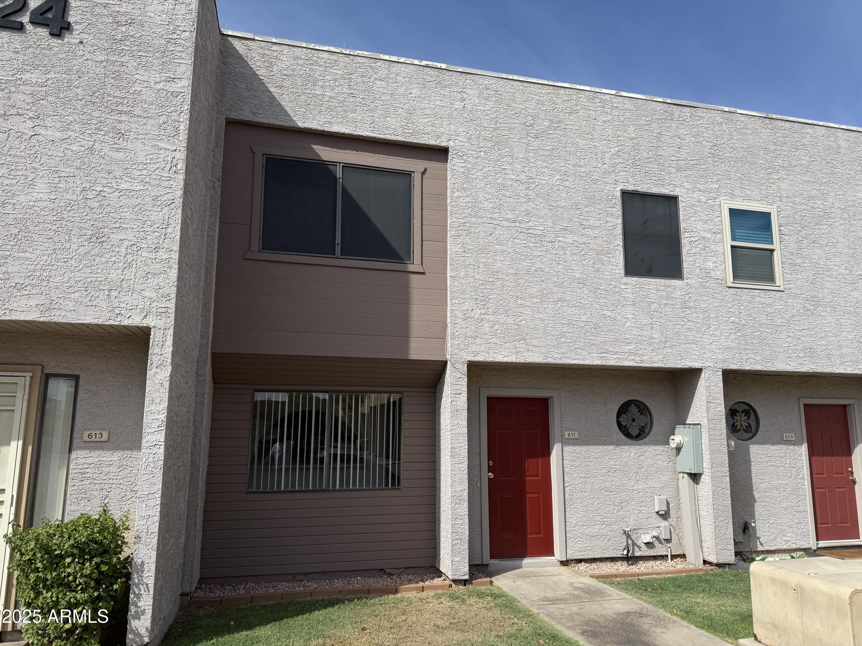 611 West 13th Street Tempe, AZ 85281 - Photo 1 of 30 a front view of a house with a yard