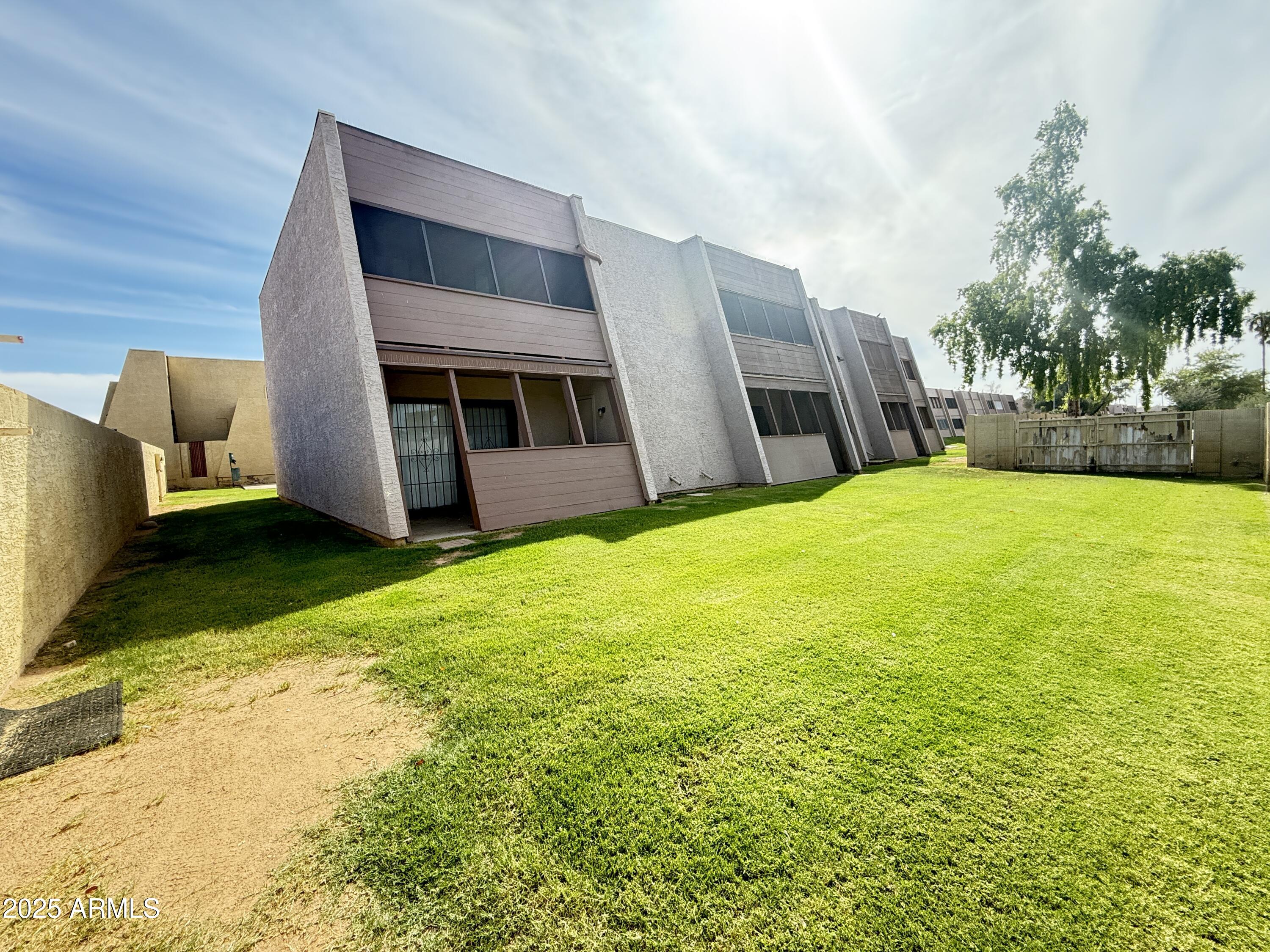 611 West 13th Street Tempe, AZ 85281 - Photo 25 of 30 a view of an house with backyard and porch