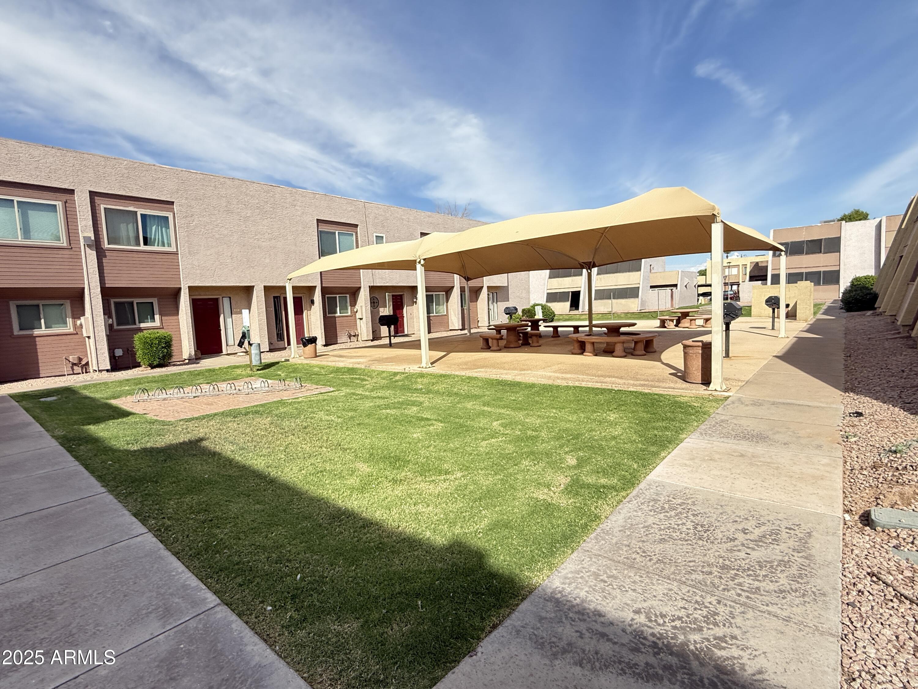 611 West 13th Street Tempe, AZ 85281 - Photo 26 of 30 a view of a building with a yard