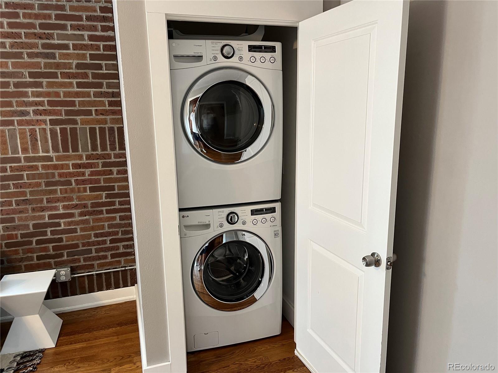 1684 Harrison Street, Unit 8 Denver, CO 80206 - Photo 14 of 21 a utility room with dryer and washer