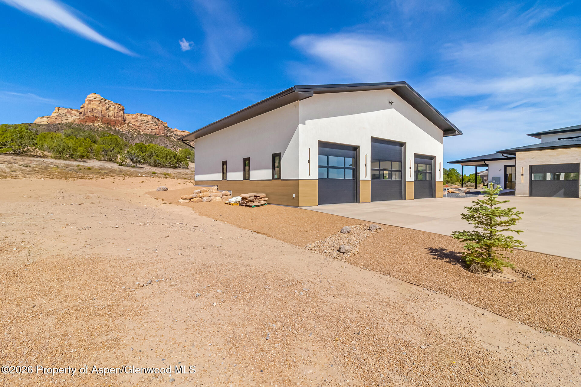 2216 Rimrock Road Grand Junction, CO 81507 - Photo 18 of 84 a view of a house with a yard