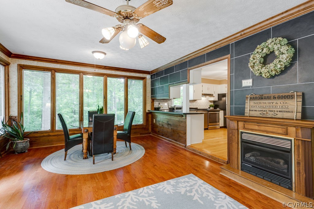 10200 Qualla Road Chesterfield, VA 23832 - Photo 24 of 47 a living room with fireplace furniture and a floor to ceiling window