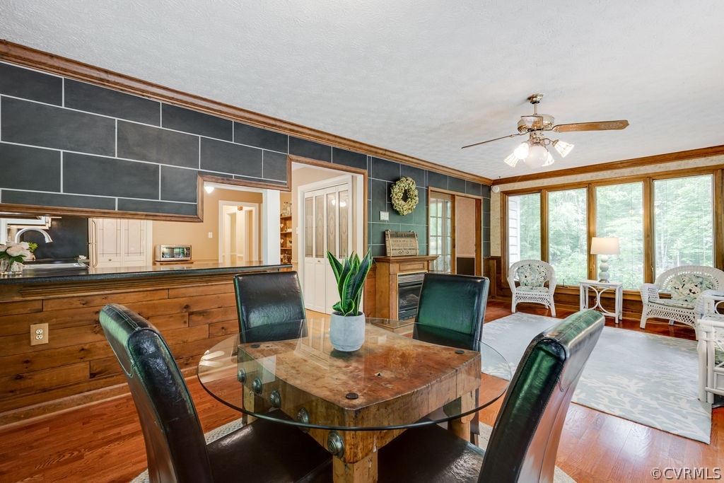 10200 Qualla Road Chesterfield, VA 23832 - Photo 25 of 47 a dining room with furniture window and wooden floor