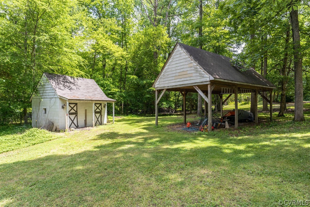 10200 Qualla Road Chesterfield, VA 23832 - Photo 6 of 47 a view of a house with backyard and sitting area