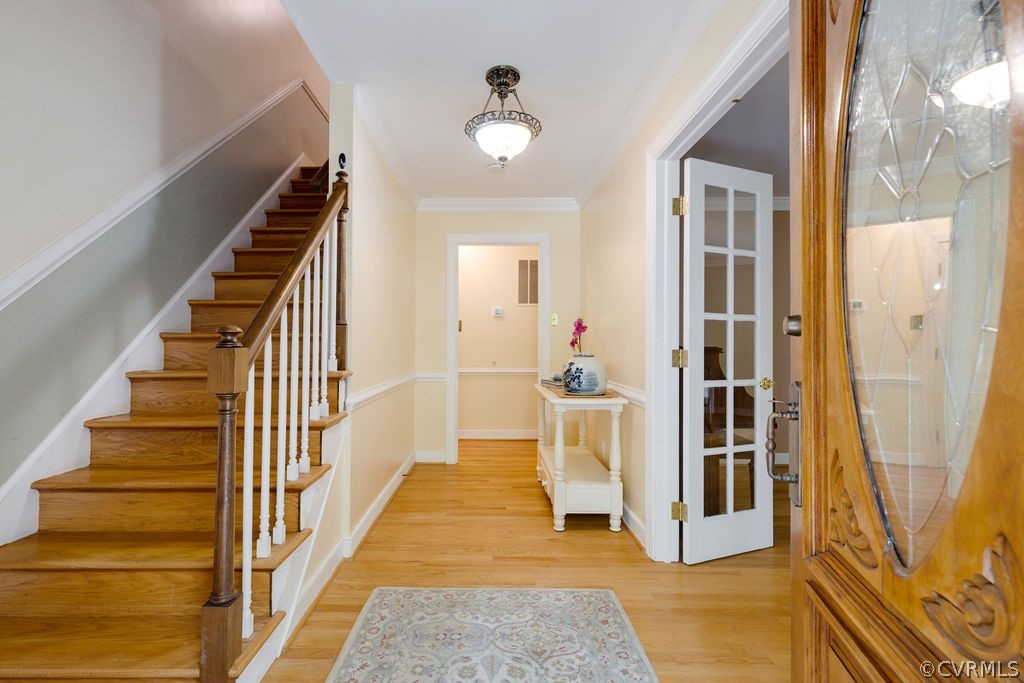 10200 Qualla Road Chesterfield, VA 23832 - Photo 9 of 47 a view of a hallway with wooden floor and entryway