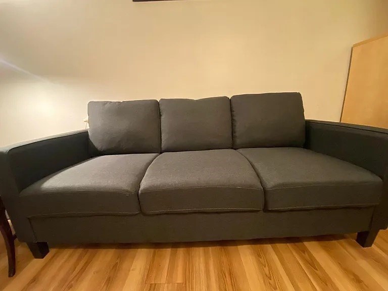 72 Bay State Road, Unit G Boston, MA 02215 - Photo 18 of 25 a blue bed sitting in a bedroom next to a larger window