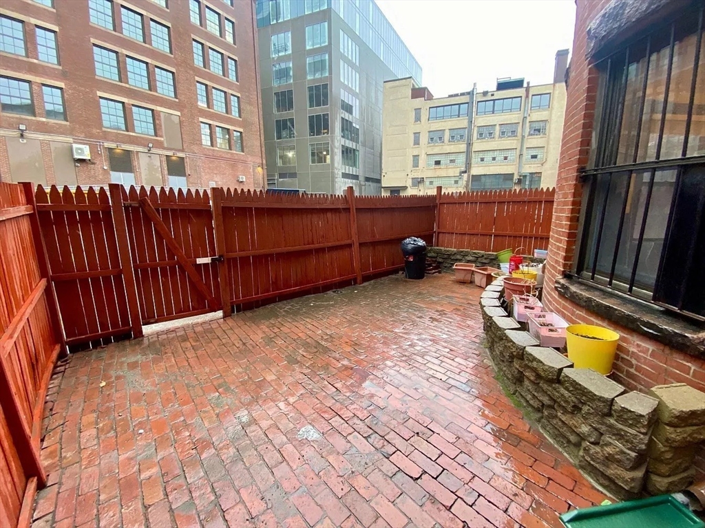 72 Bay State Road, Unit G Boston, MA 02215 - Photo 19 of 25 a view of swimming pool with outdoor seating