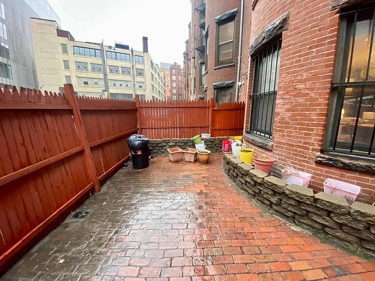 72 Bay State Road, Unit G Boston, MA 02215 - Photo 21 of 25 a view of a pathway along the building