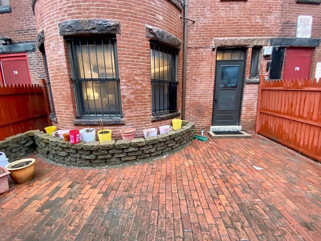 72 Bay State Road, Unit G Boston, MA 02215 - Photo 22 of 25 a front view of a house