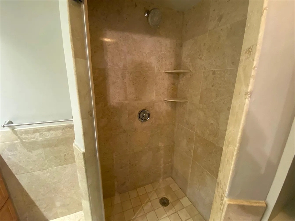 72 Bay State Road, Unit G Boston, MA 02215 - Photo 10 of 25 a bathroom with a shower