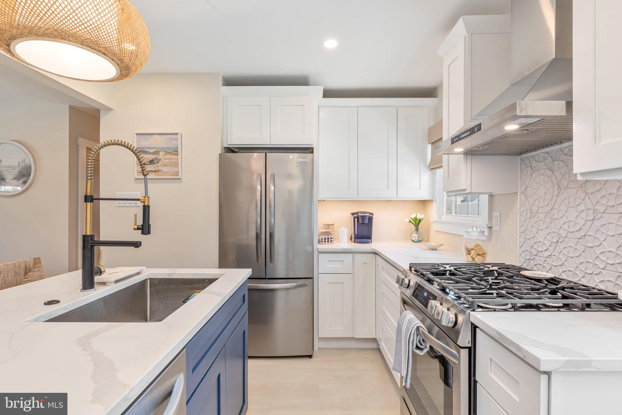 126 Colwick Drive Somers Point, NJ 08244 - Photo 18 of 46 a kitchen with a sink stove and refrigerator