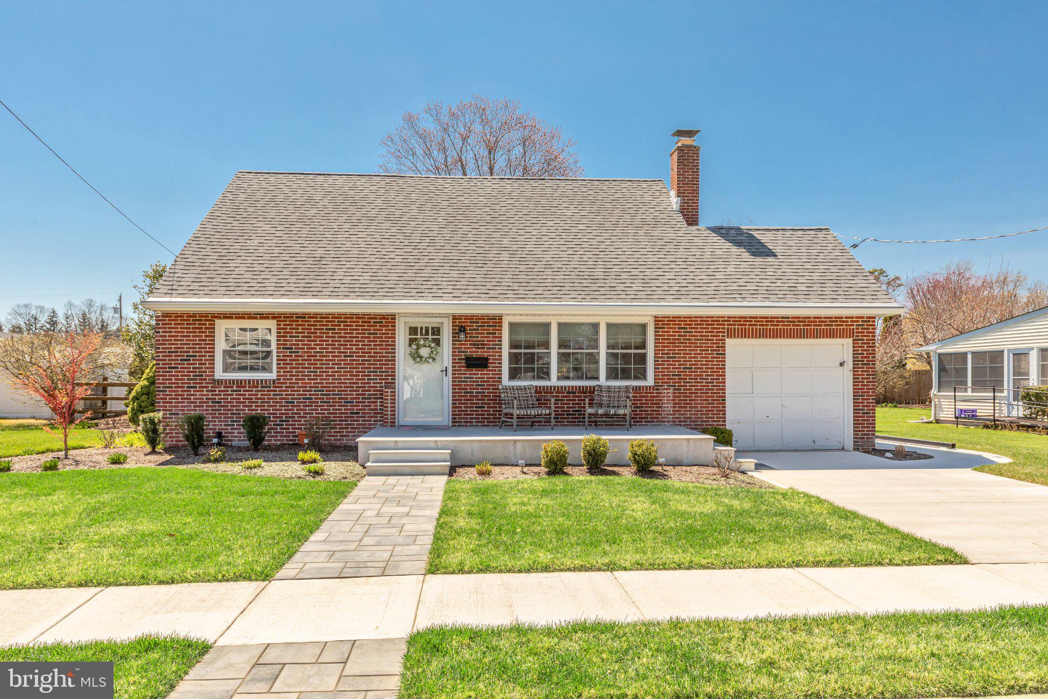 126 Colwick Drive Somers Point, NJ 08244 - Photo 2 of 46 a front view of a house with a yard